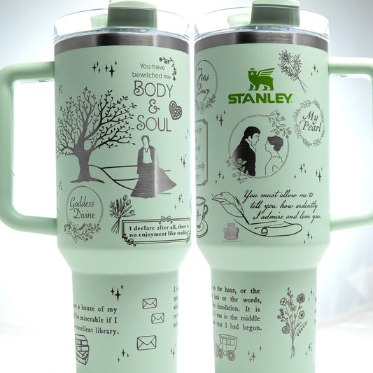 two travel mugs with pictures of people on them