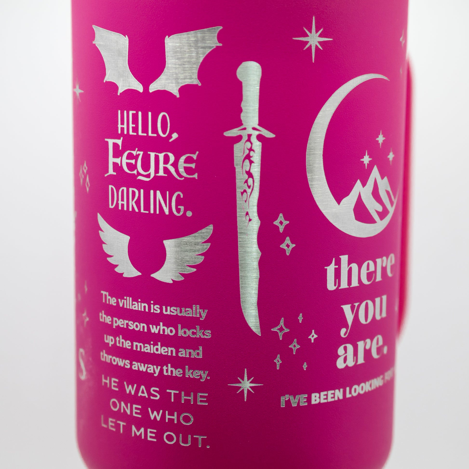 a pink can with some writing on it