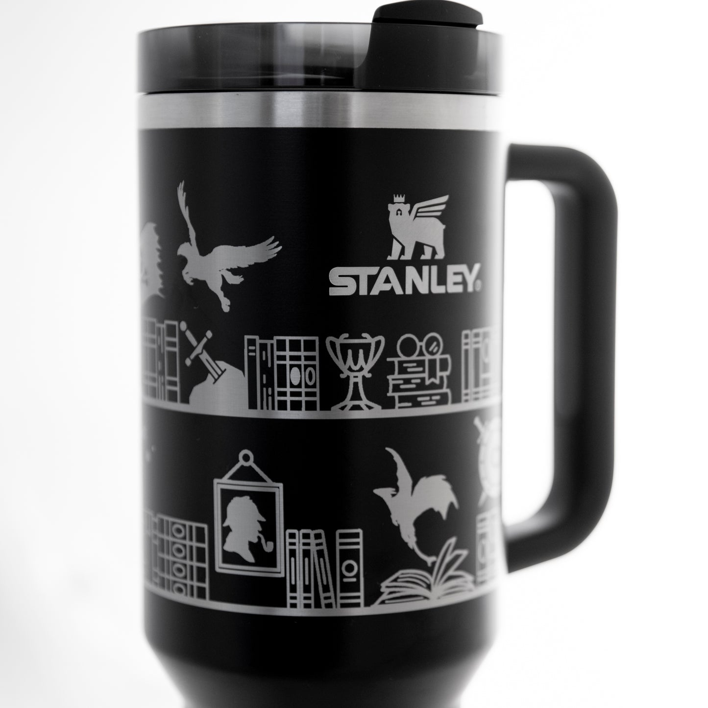 a black and white photo of a travel mug