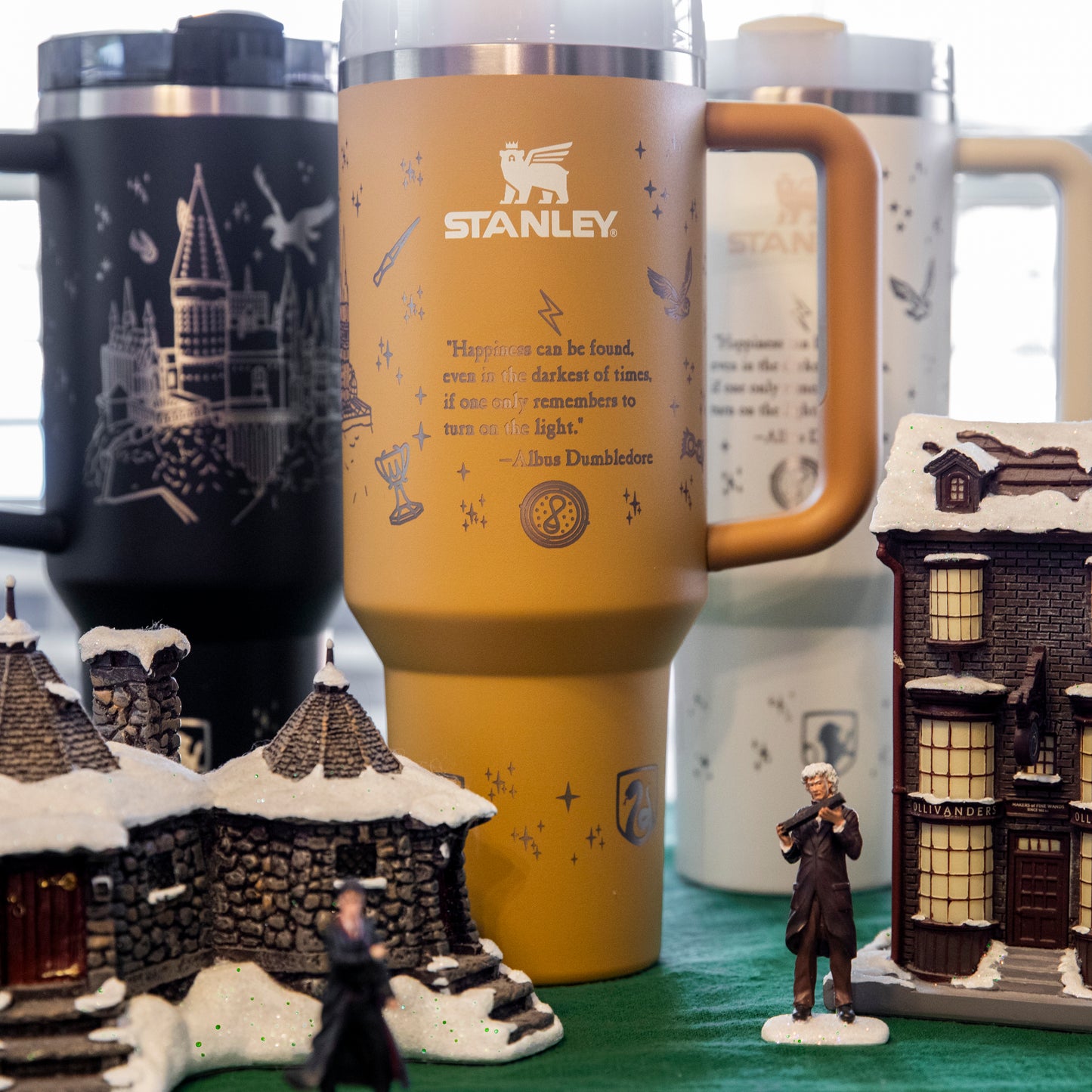 a couple of coffee mugs sitting on top of a table