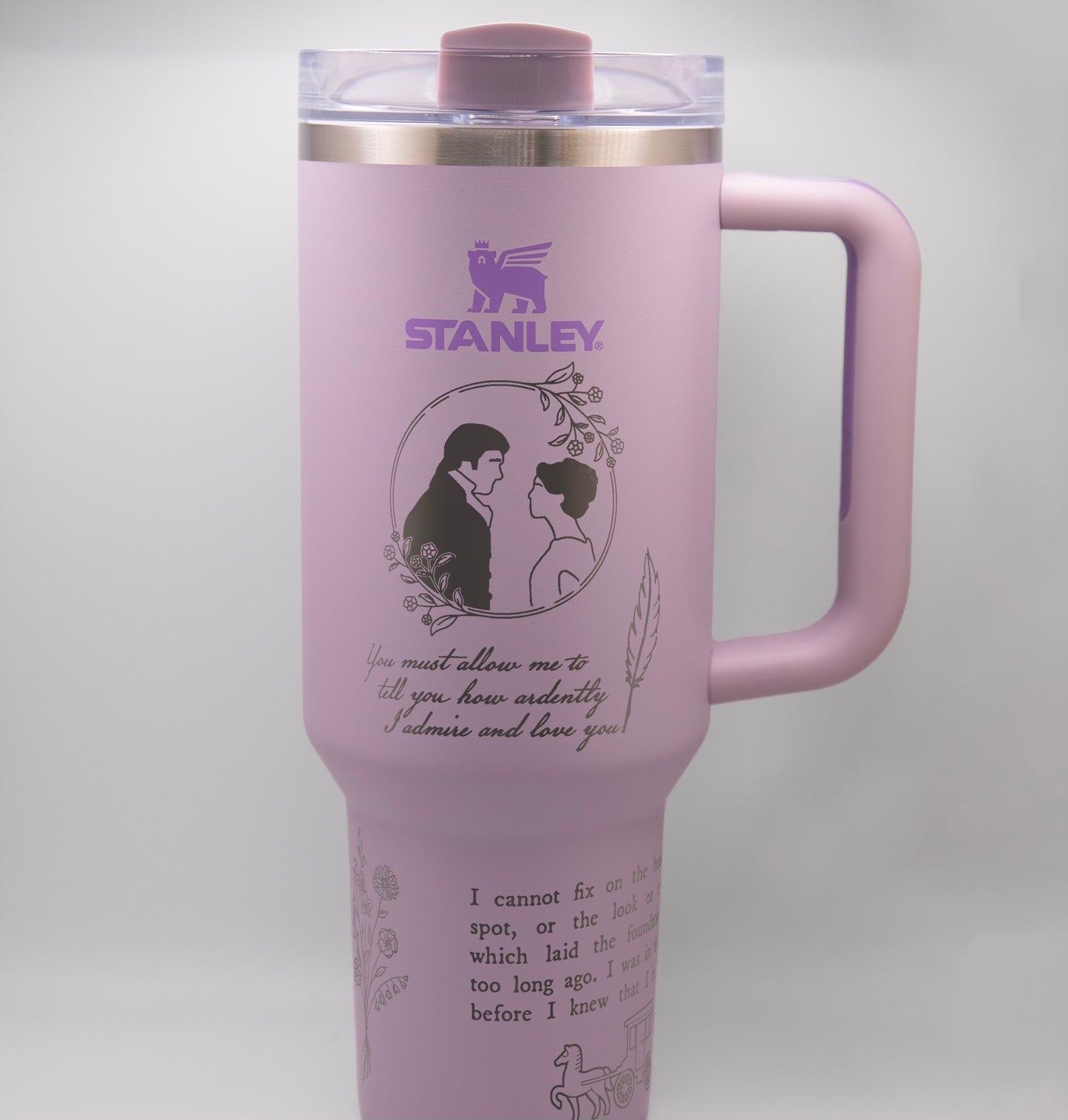 a pink travel mug with a picture of a man and a woman on it