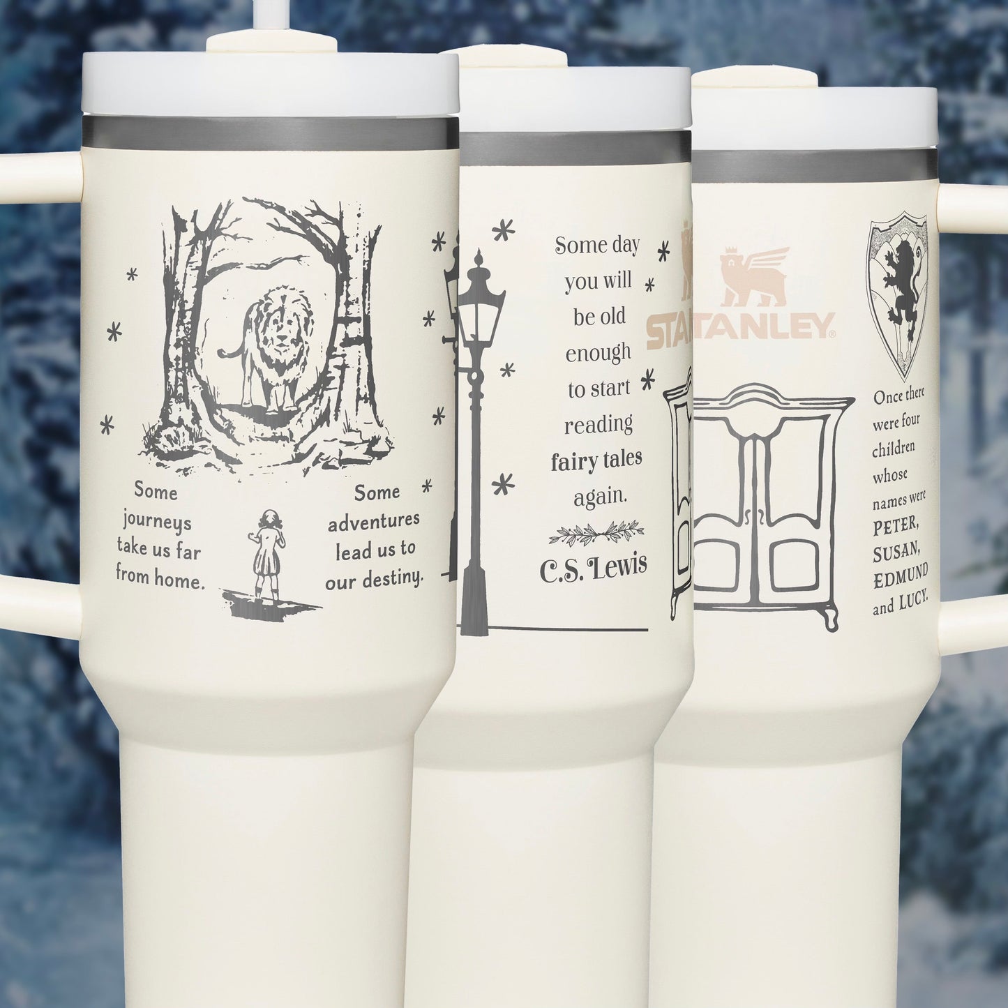 three white travel mugs with pictures on them