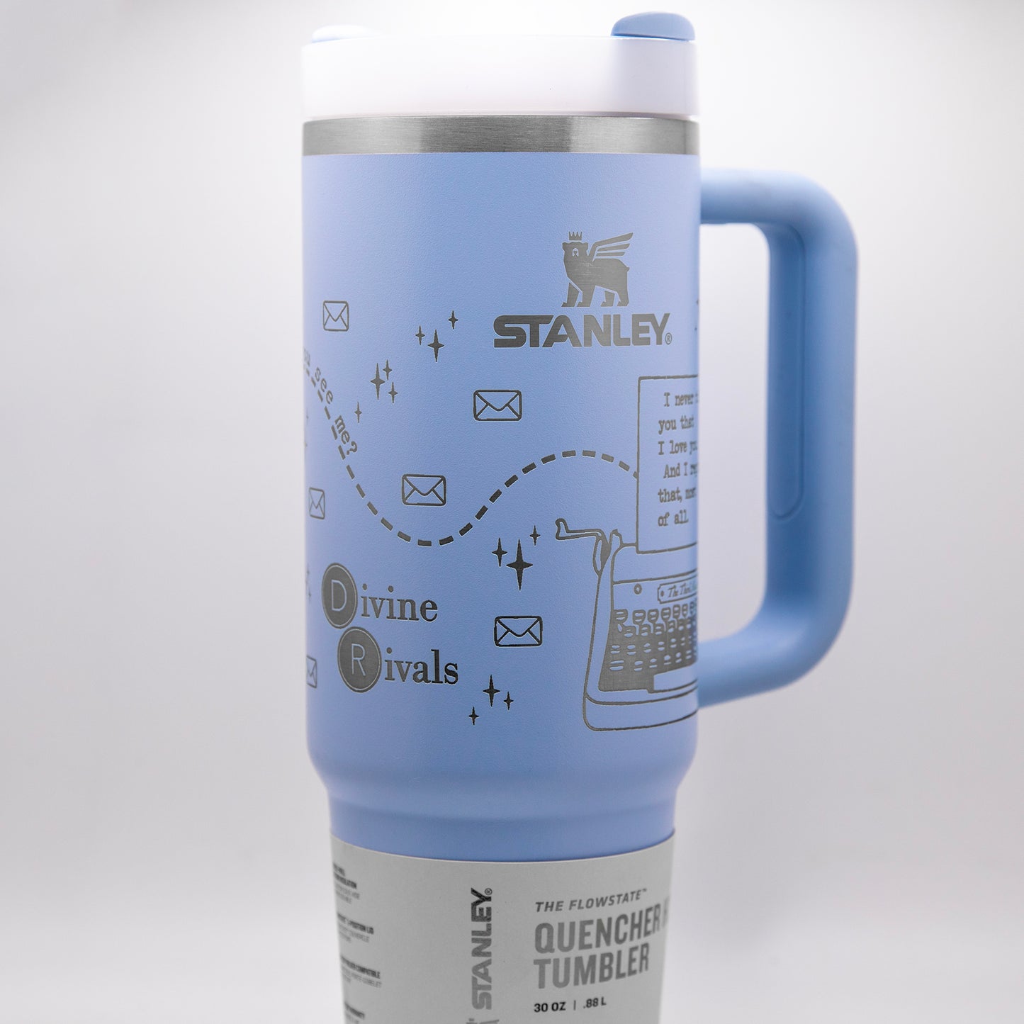 a blue travel mug with a blue handle