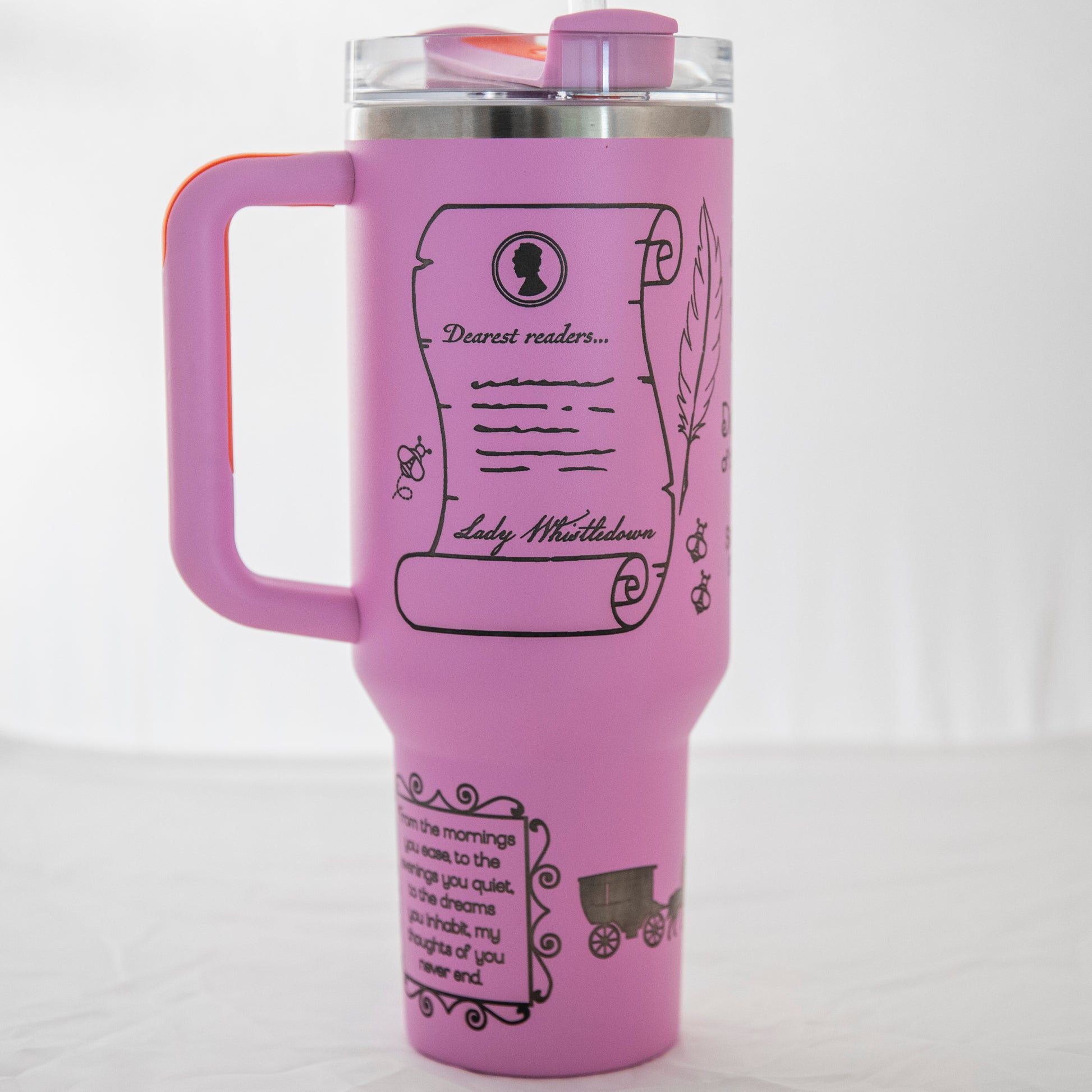 a purple travel mug with a drawing on it