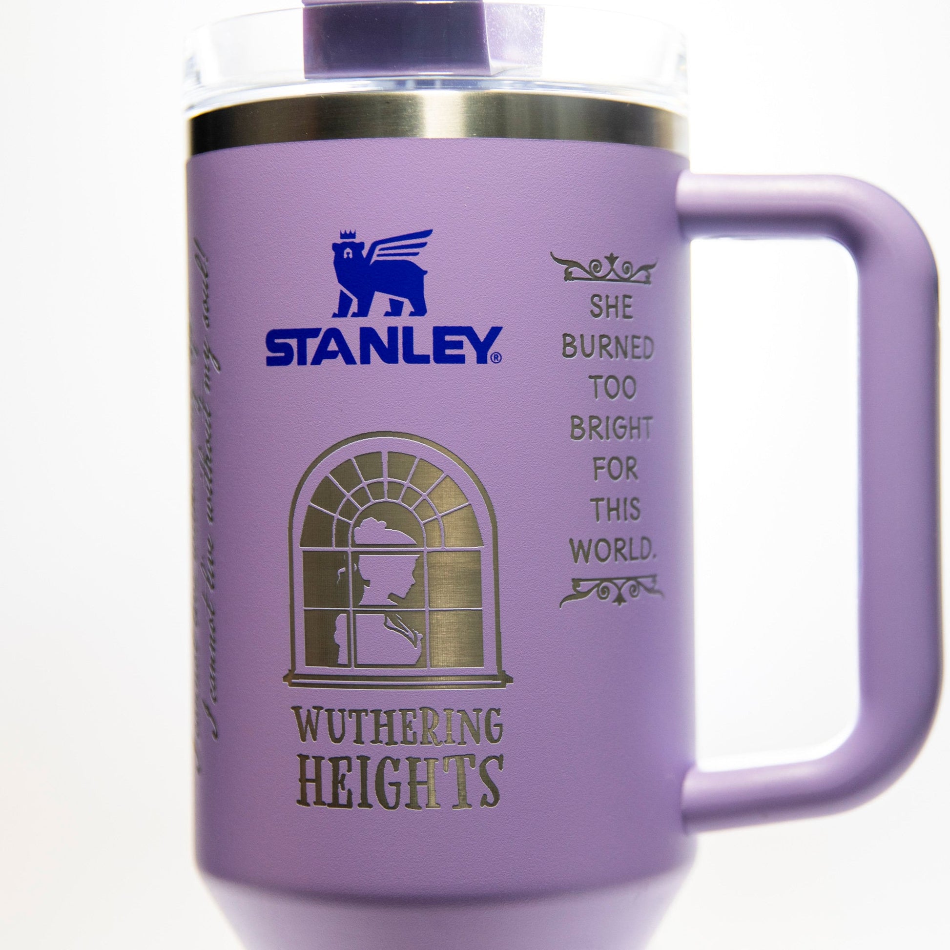 a purple coffee mug with a window and words on it