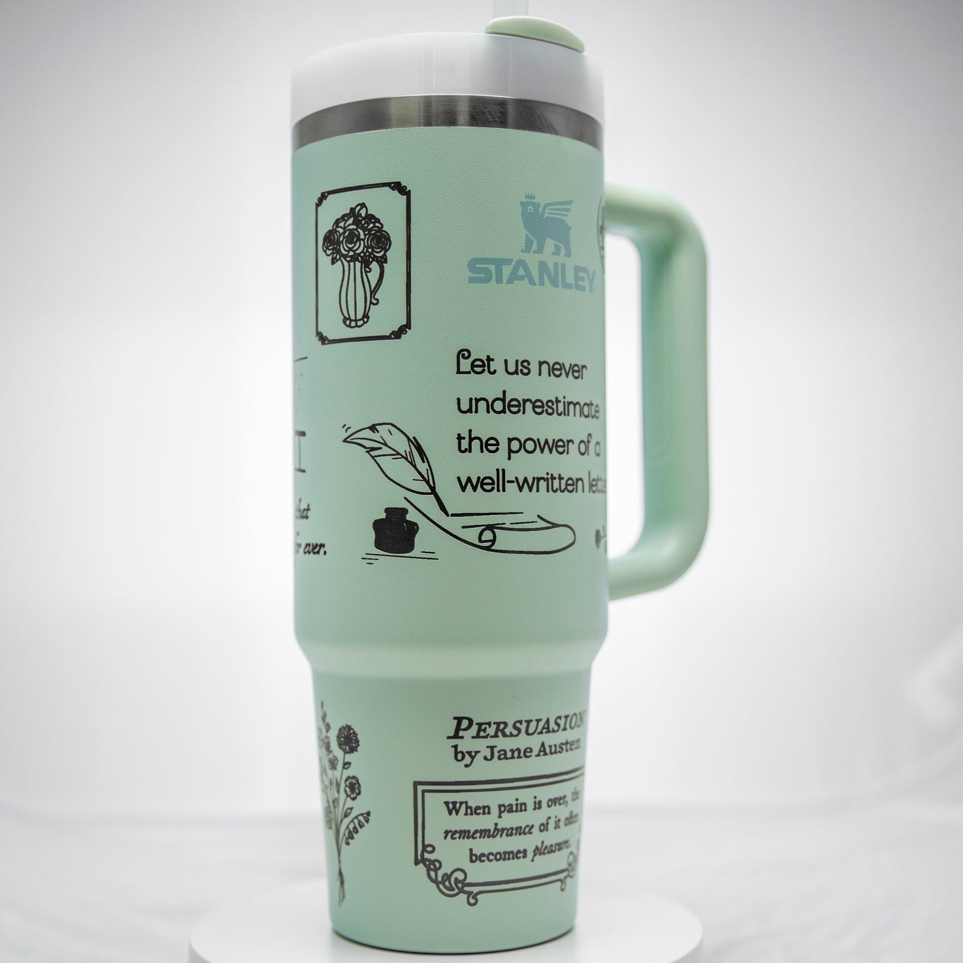 a green travel mug with instructions on it