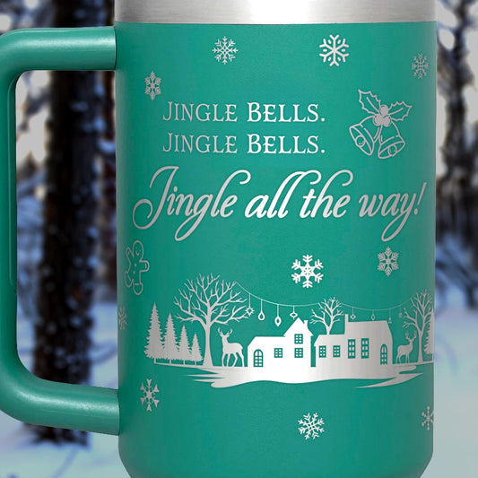 a green mug with a christmas message on it