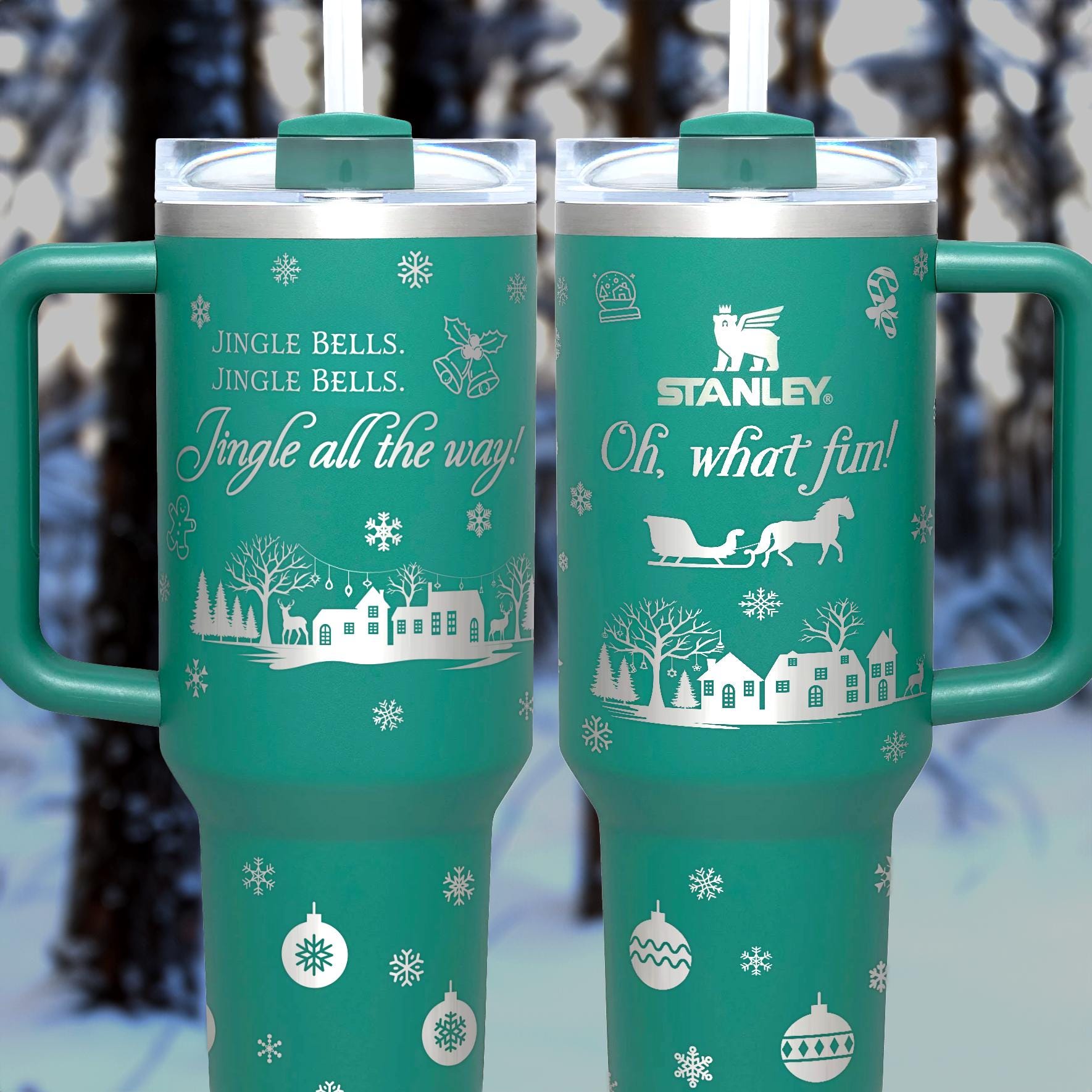 two green travel mugs sitting in the snow