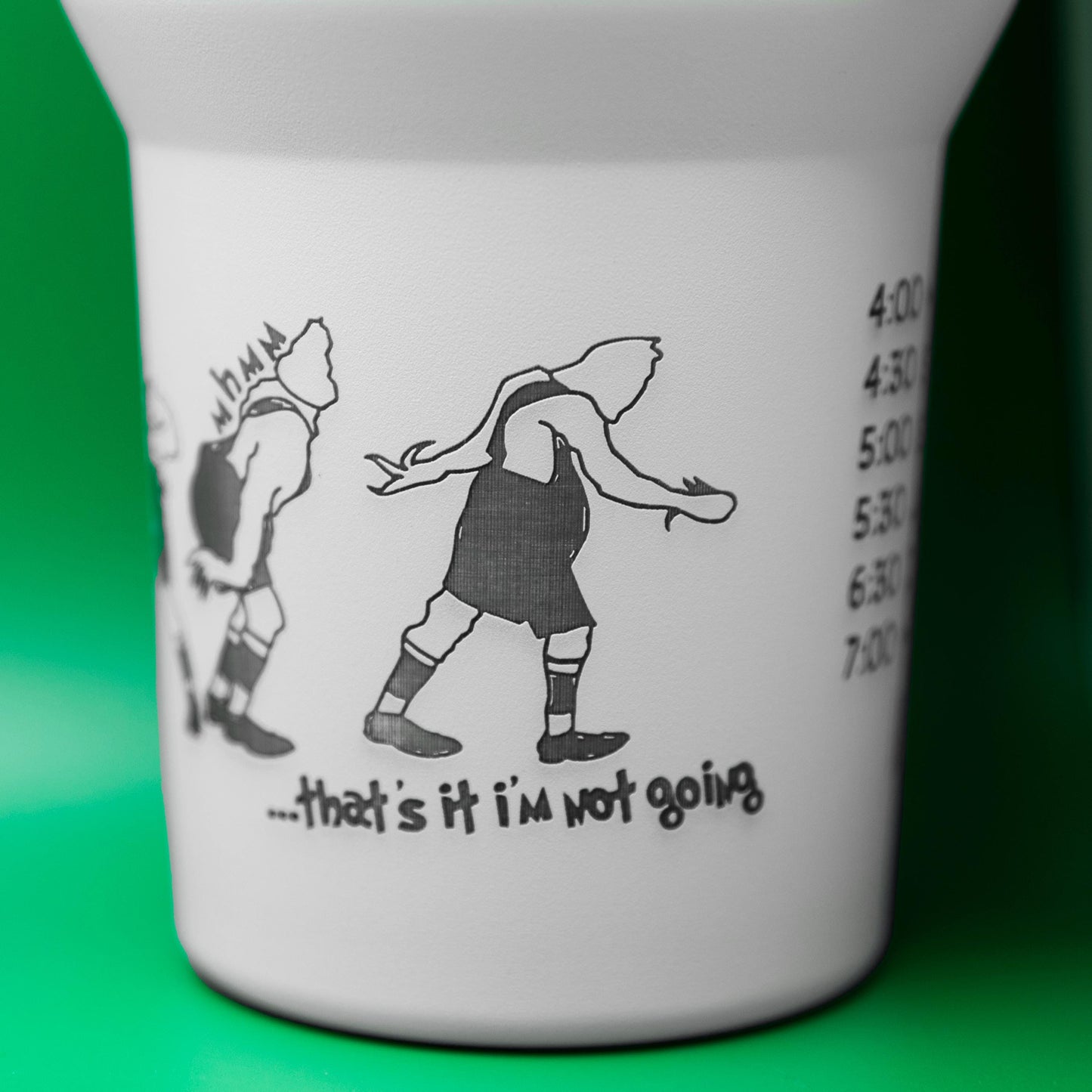 a coffee cup with a picture of a boy and a girl on it